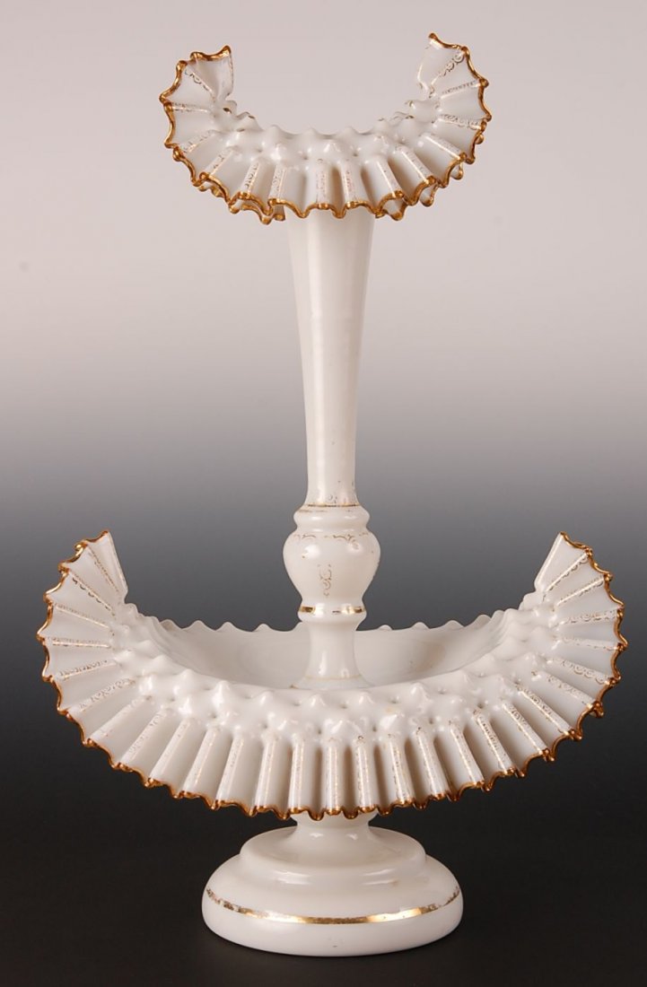 FINE 18-INCH BRISTOL GLASS SINGLE LILY EPERGNE: Gold trimmed custard colored Bristol glass with pronounced candy ribbon edge and impressed dimples. Measures 18.5 x 12 inches