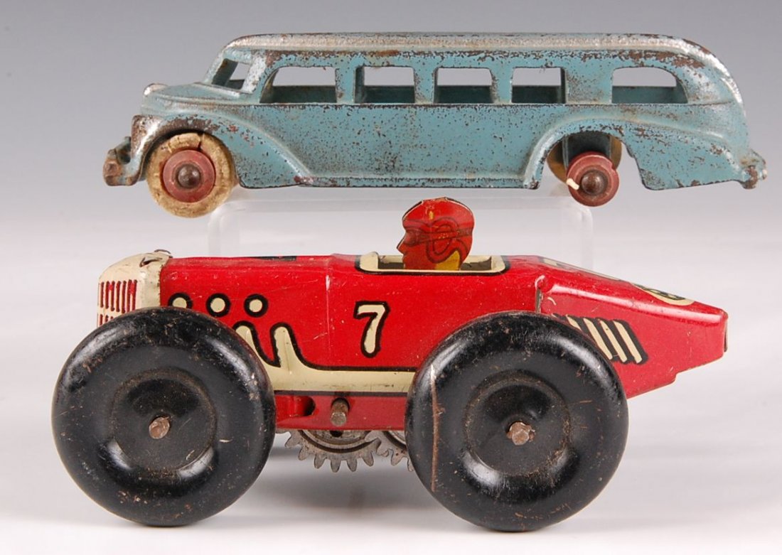 MARX # 7 TIN LITHO CAR W/ 1920s CAST IRON BUS: Marx racer measures 2 x 5 x 2.75 inches. Cast iron bus attributed to Arcade measures 1.5 x 5.5 x 1.75 inches.