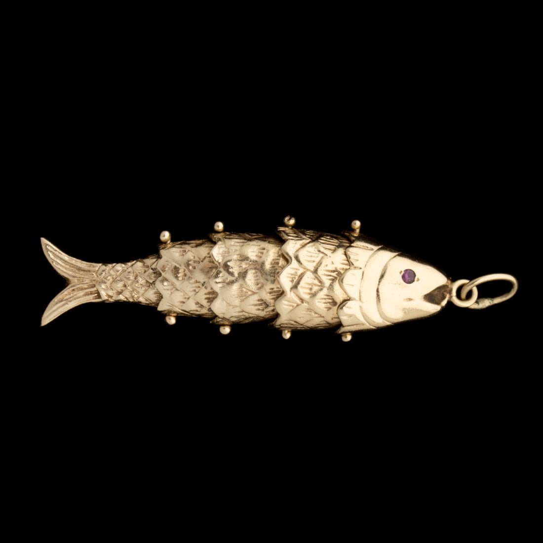 A 14K GOLD RETICULATED FISH PENDANT WITH RUBY (1 of 9)