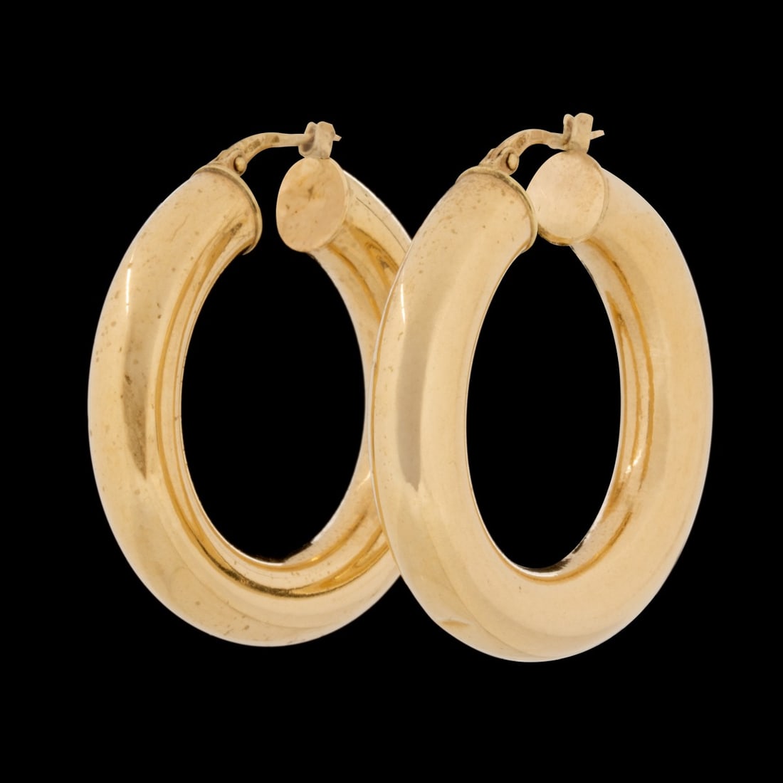 A PAIR ITALIAN 14K YELLOW GOLD HOOP EARRINGS: Th hollow hoop pair stamped 14k. Weighs 5.8 grams. Without proof of exemption, be aware that internet sales tax applies to all Internet transactions and local sales tax may apply to local pick-up tran