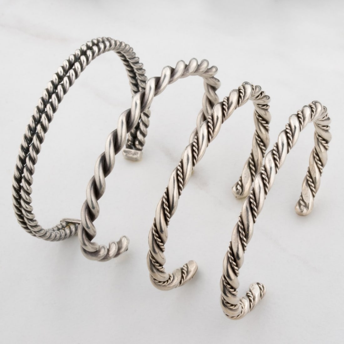 FOUR VINTAGE STERLING SILVER CUFF BRACELETS: Wrist circumference is 6 inch. Total weight off all bangles is 2.28 ozt. Without proof of exemption, be aware that internet sales tax applies to all Internet transactions and local sales tax may apply