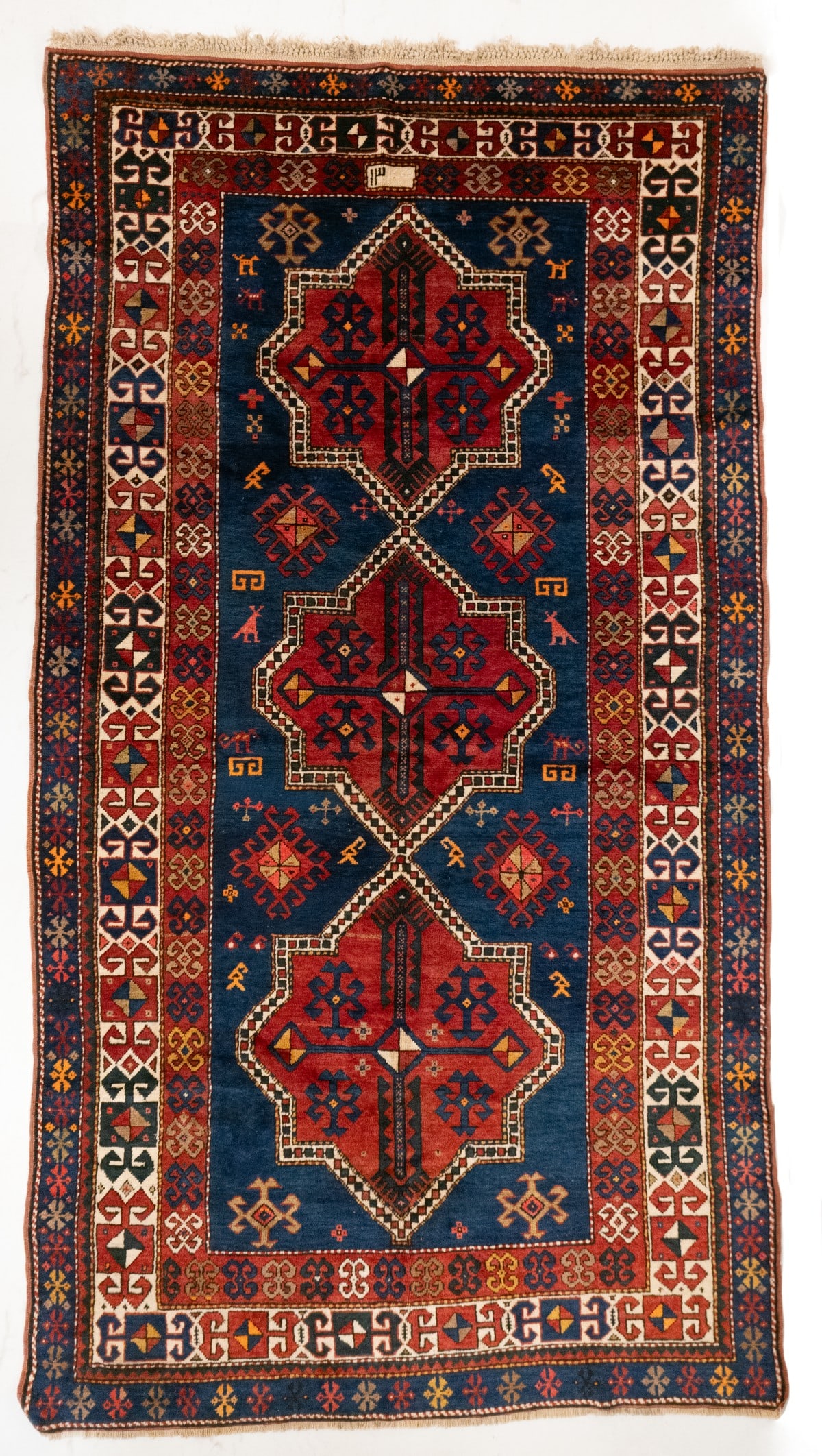 KAZAK TRIPLE MEDALLION RUG, DATED AH 1345/AD 1926 (1 of 16)