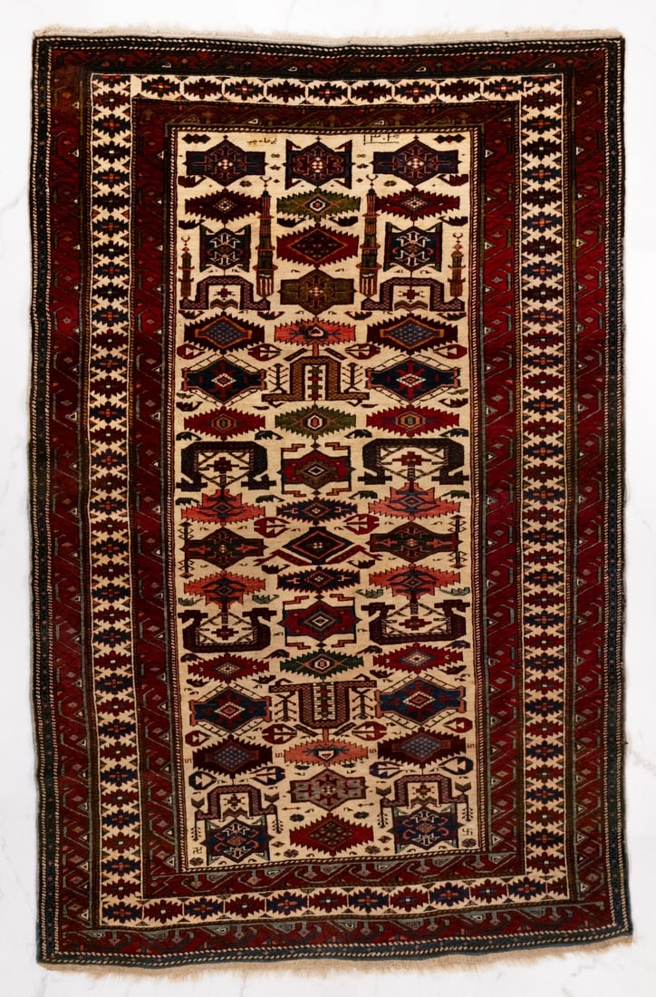 A FINE KUBA RUG, NE CAUCASUS, DATED AH 1304/AD 1886 (1 of 12)
