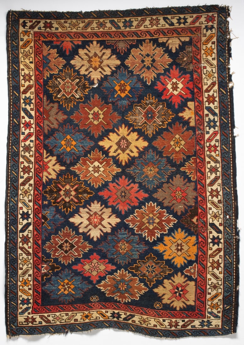 A KUBA 'BLOSSOM' RUG, NORTH EAST CAUCASUS, CIRCA 1900 (1 of 17)