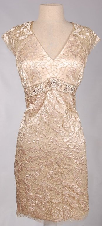 SUE WONG LACY DRESS IN 'ANTIQUE CHAMPAGNE', SZ 12: Lacy dress embroidered with metallic threads and beads, rhinestones at the waist, sheer shoulders and back, side zip, 100% nylon over a polyester lining. Measures 23 inches from the waist. New, never 
