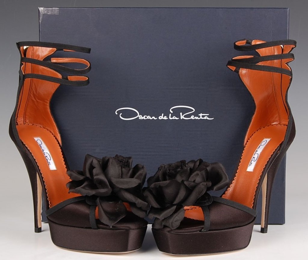 OSCAR DE LA RENTA BLACK SATIN DRESS SANDAL, SZ 6.5: Platform sandal in black satin, all leather with a satin flower, triple ankle straps with a back zipper, original box and dust bag. Size 6.5 (37) with heel height of 4.5 inches and a platform size of 