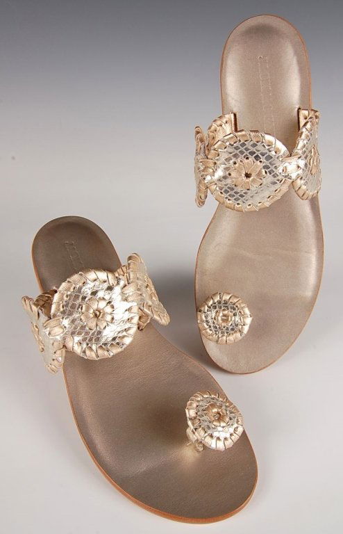 JACK ROGERS SANTA FE FLAT SANDALS, SZ 7.5: White and gold leather sandals with a toe ring, leather upper and sole with rubber heel. Size 7.5 M with heel height of 7/8 of an inch. New, never worn.