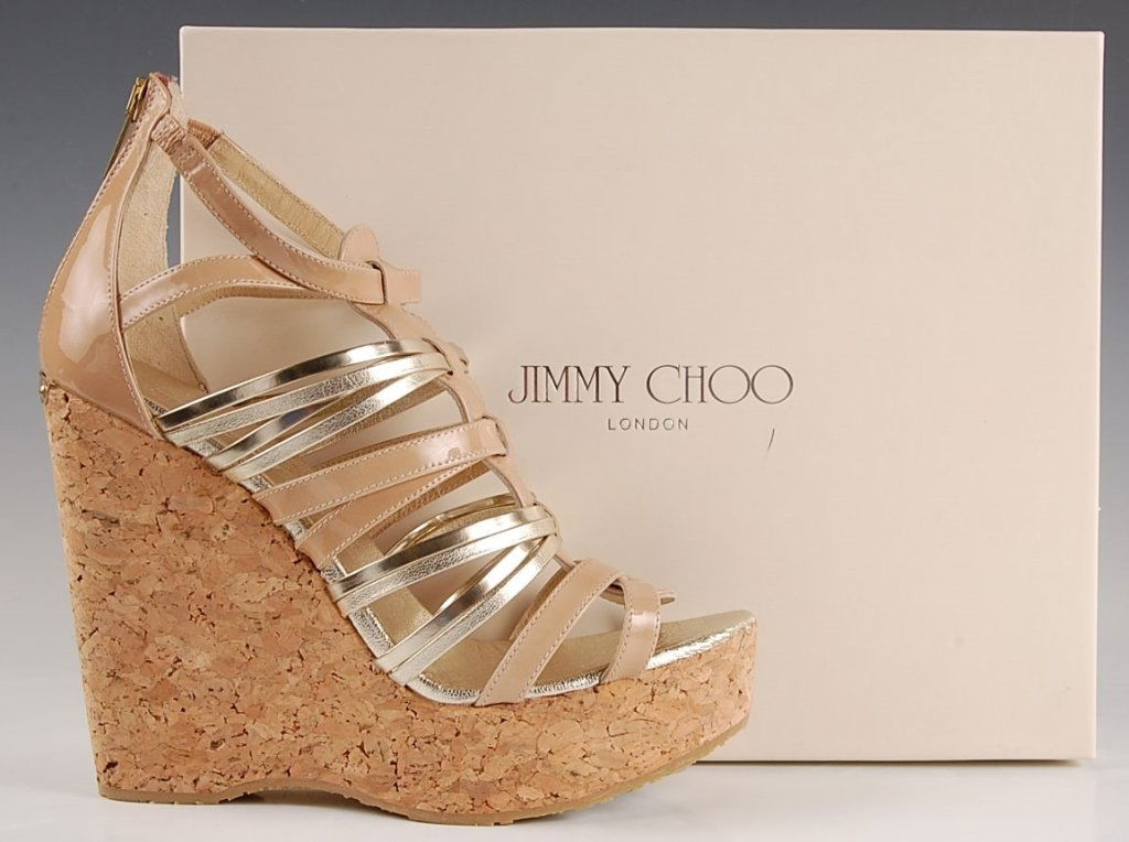 JIMMY CHOO PATENT CORK WEDGE SANDAL, SZ 7.5: Nude patent leather and gold upper, rounded open toe, leather lined with lightly cushioned insole, rubber sole, cork wedge heel with metal logo tag, original box and dust bag. Size 7.5 (38) with heel