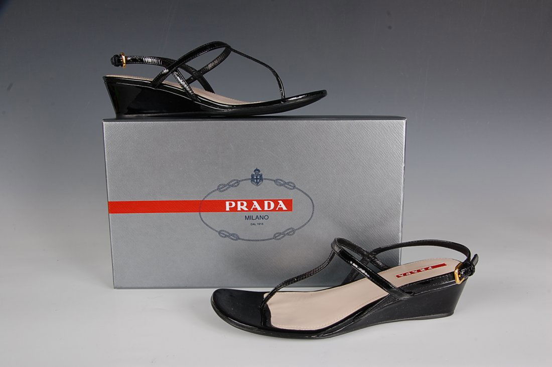 PRADA PATENT T-STRAP WEDGE SANDALS, SZ 7.5: Patent leather t-strap low wedge sandals with leather upper and insole, rubber sole, original box, size 38/7.5.