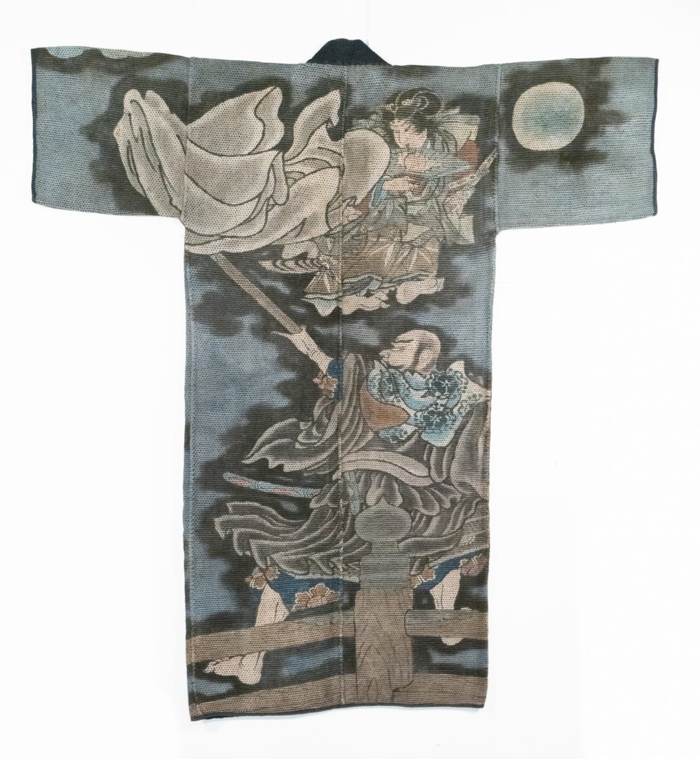 A MUSEUM QUALITY JAPANESE FIREMAN'S COAT, ADAIR ESTATE: The magnificent 19th century firefighter's jacket of thick multi-layered hand-loomed cotton is a masterpiece of kajibanten art as well as a masterpiece of Japanese folk art. The back is dyed in a scen