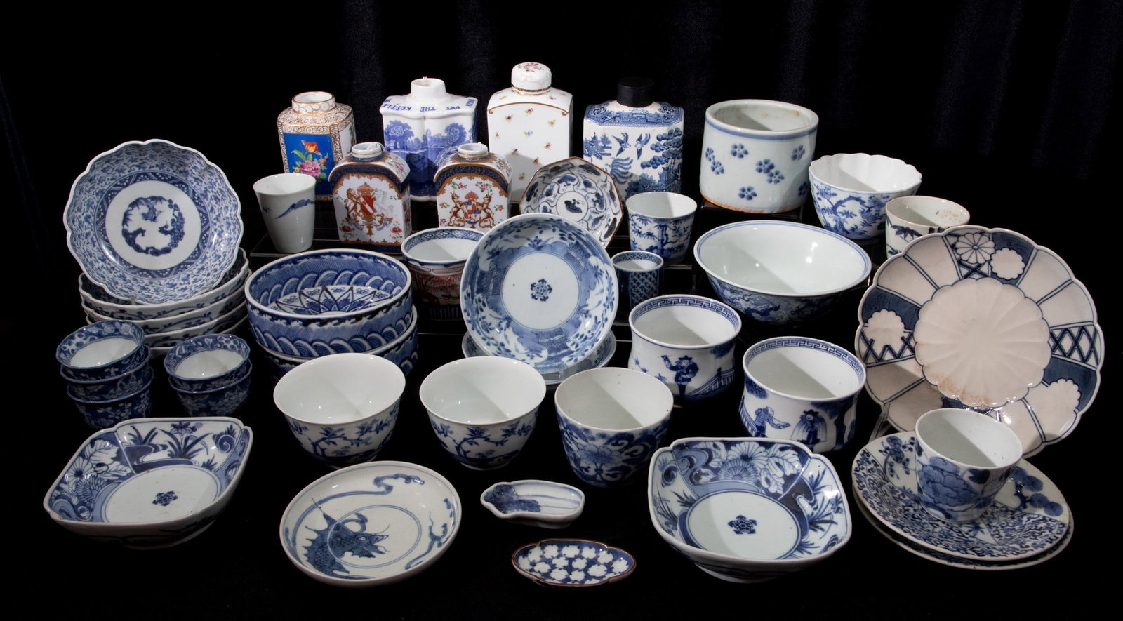 MEIJI AND OTHER JAPANESE BLUE AND WHITE PORCELAIN: The entire collection as shown. The cost of packing and shipping could exceed $3 per item. Sizes range from 1.75 to 7.25 inches. Provenance: The estate of John Adair Jr. (1942-2025), founder and propr