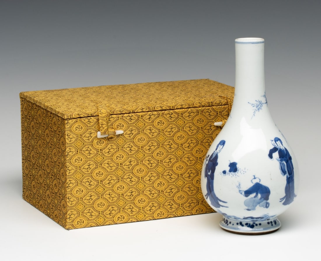 A KANGXI PERIOD STYLE CHINESE BLUE AND WHITE VASE: The pear shape bottle vase is unmarked. Measures 8.5H x 4.25 inches. Provenance: The estate of John Adair Jr. (1942-2025), founder and proprietor of Kurofune Antiques, Tokyo (est. 1978). A world-renow
