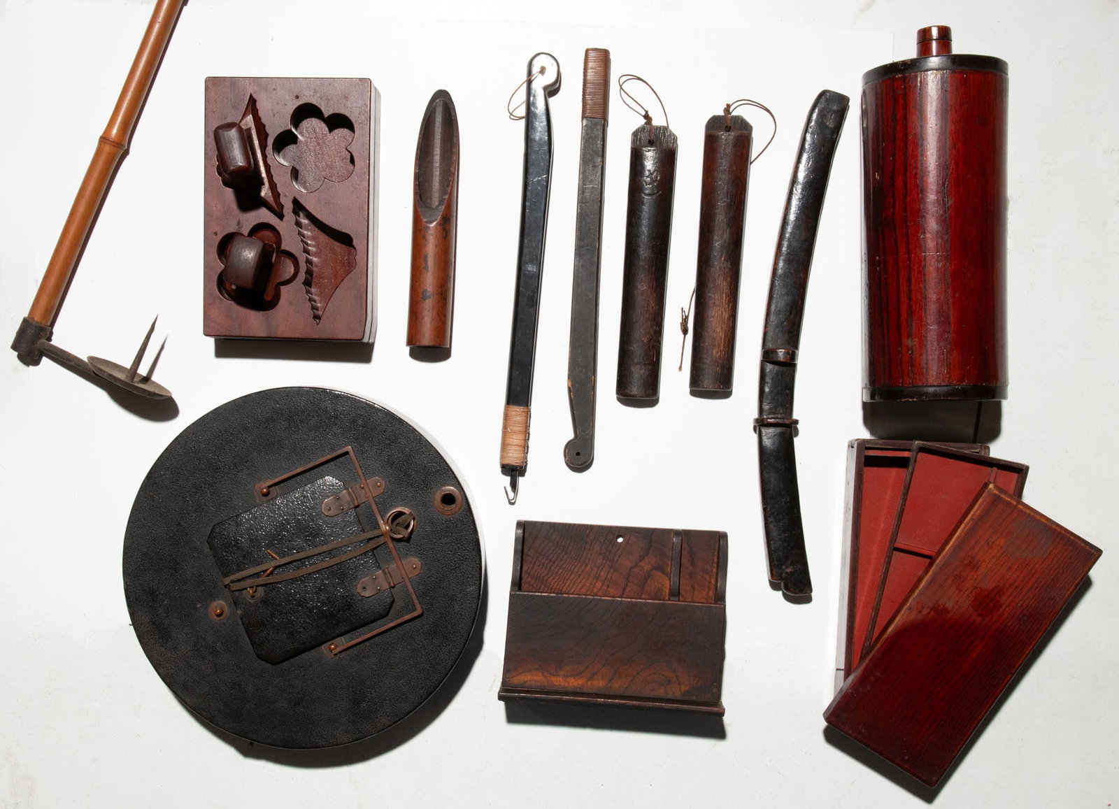 MEIJI AND OTHER PERIOD JAPANESE OBJECTS AND ARTIFACTS: The collection as shown. Sizes range from 8 to 25 inches in length. Provenance: The estate of John Adair Jr. (1942-2025), founder and proprietor of Kurofune Antiques, Tokyo (est. 1978). A world-renown