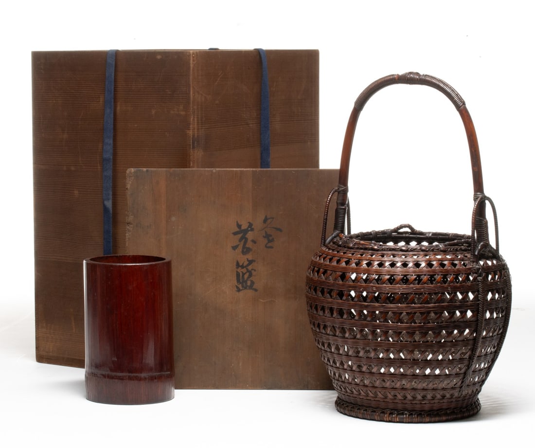 TANABE CHIKUUNSAI HEXAGONAL PLAIT BASKET, ADAIR ESTATE: The high-shouldered bell-form basket is woven in a complex open-work hexagonal plait that creates a net-like body with precise horizontal bands of twining and tightly woven braided vertical stays