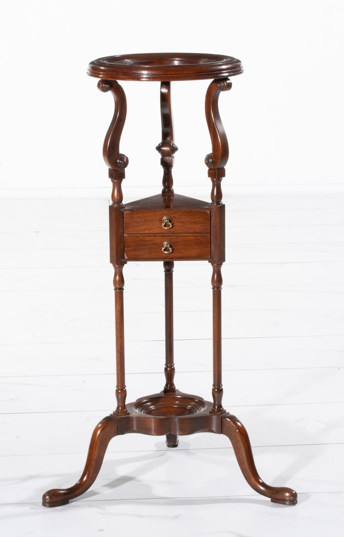 A GEORGIAN STYLE MAHOGANY WIG STAND: Early 20th century. Measures 32 x 12 inches in diameter. Provenance: The estate of John Adair Jr. (1942-2025), founder and proprietor of Kurofune Antiques in Tokyo (est. 1978), a world-renowned destin