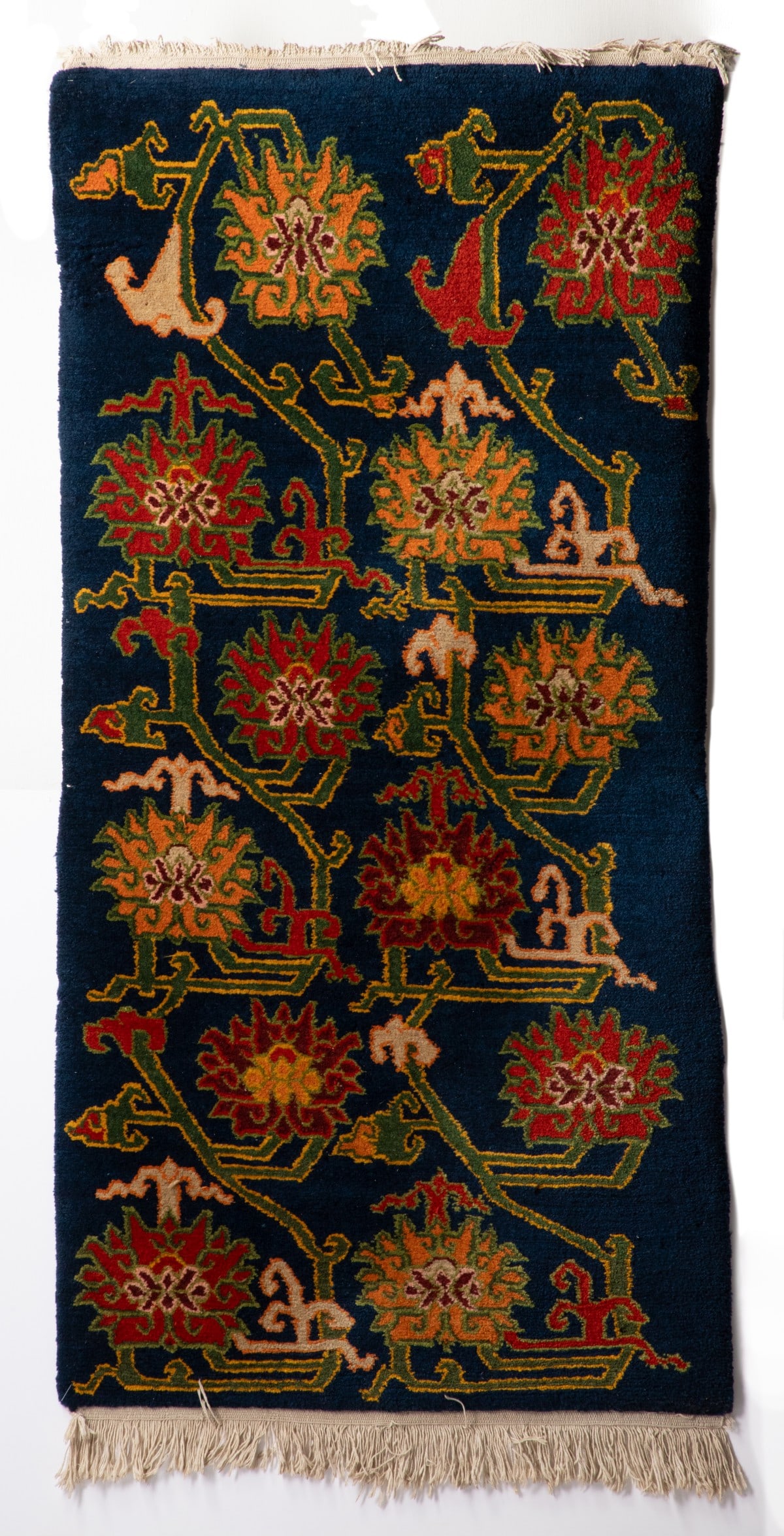 A MODERN TIBETAN PILE RUG: Measures approximately 72 x 36 inches; 6ft. x 3ft; 183 x 92cm. Provenance: The estate of John Adair Jr. (1942-2025), founder and proprietor of Kurofune Antiques in Tokyo (est. 1978), a world-renowned 