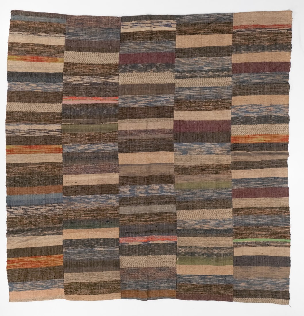 A JAPANESE SAKI-ORI TEXTILE BEDCOVER: A circa early 20th century Japanese recycled cotton saki-ori blanket. Measures 71 x 68 inches. Provenance: The estate of John Adair Jr. (1942-2025), founder and proprietor of Kurofune Antiques in Toky