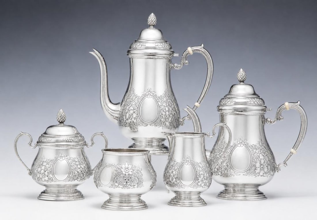 A FIVE-PIECE HAND CHASED STERLING SILVER TEA SET (1 of 11)