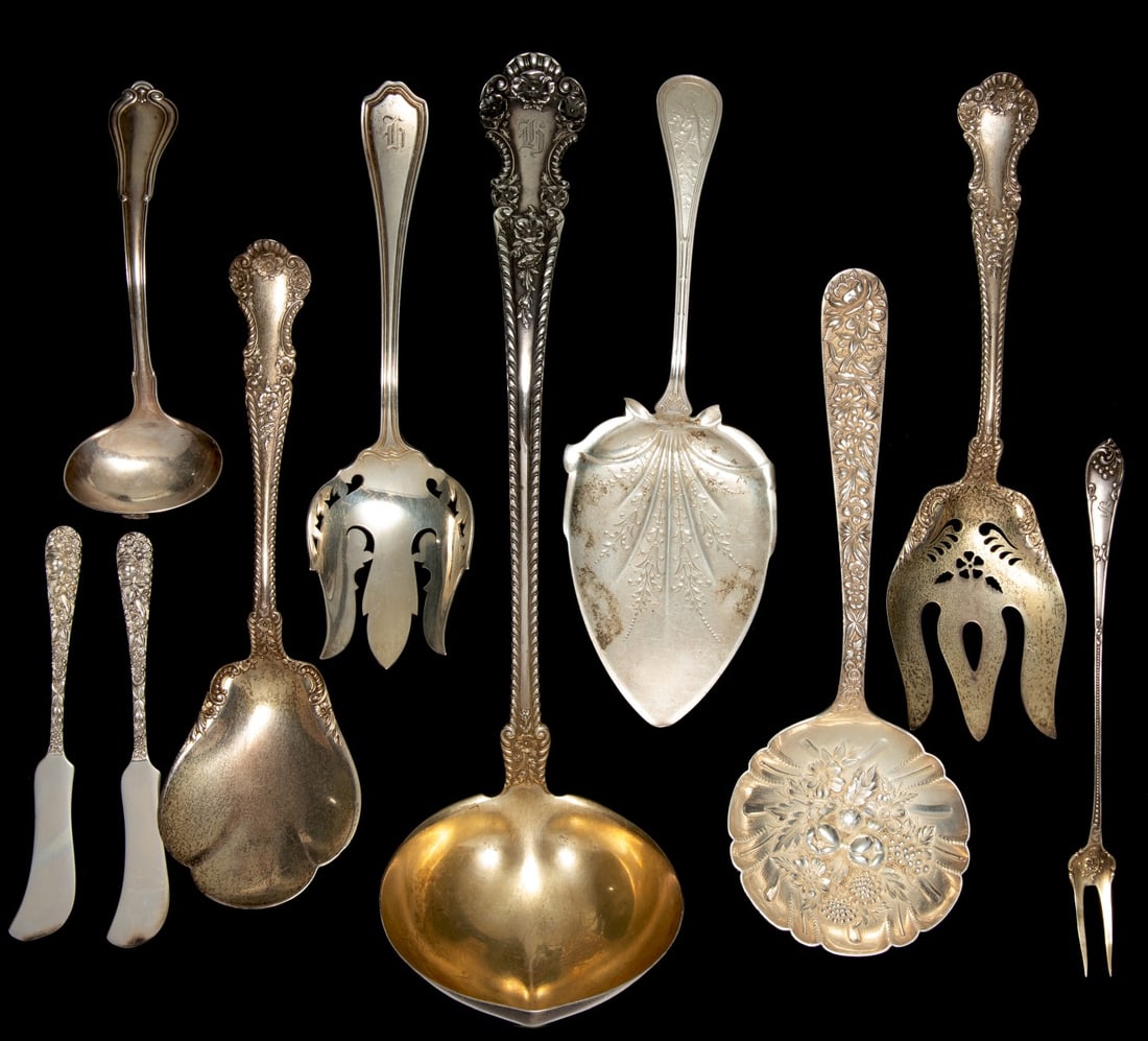 A COLLECTION OF ORNATE ANTIQUE STERLING SILVER SERVERS (1 of 10)