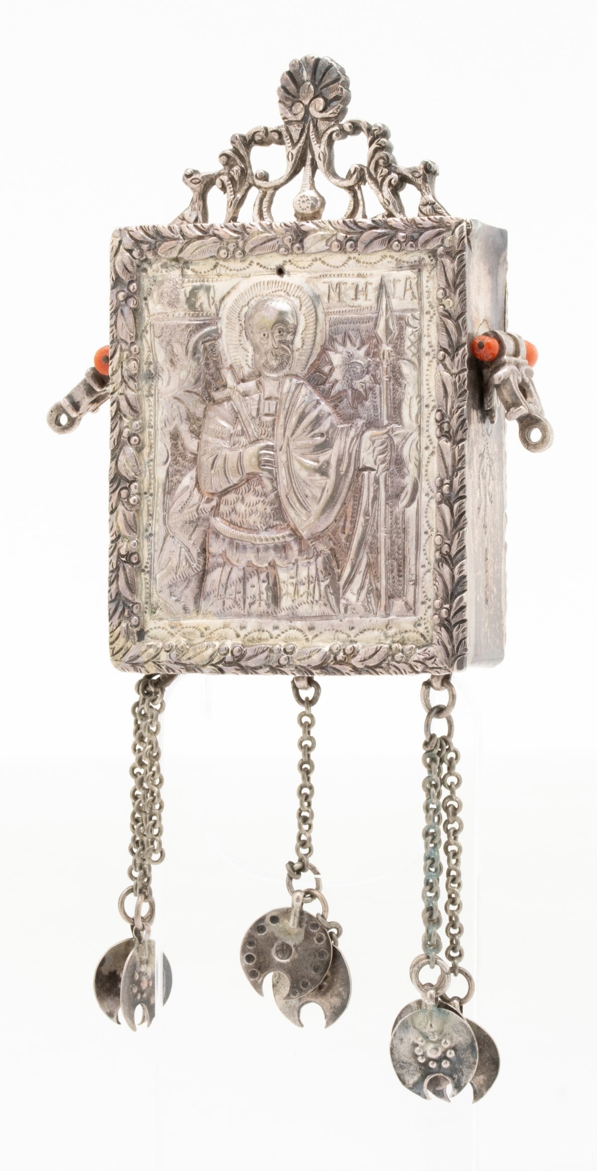 AN EASTERN ORTHODOX CHRISTIAN RELIQUARY: The white metal reliquary contains two small carvings from bone. Measures 6 x 4 inches and weighs 3.9 ozt. Without proof of exemption, be aware that internet sales tax applies to all Internet