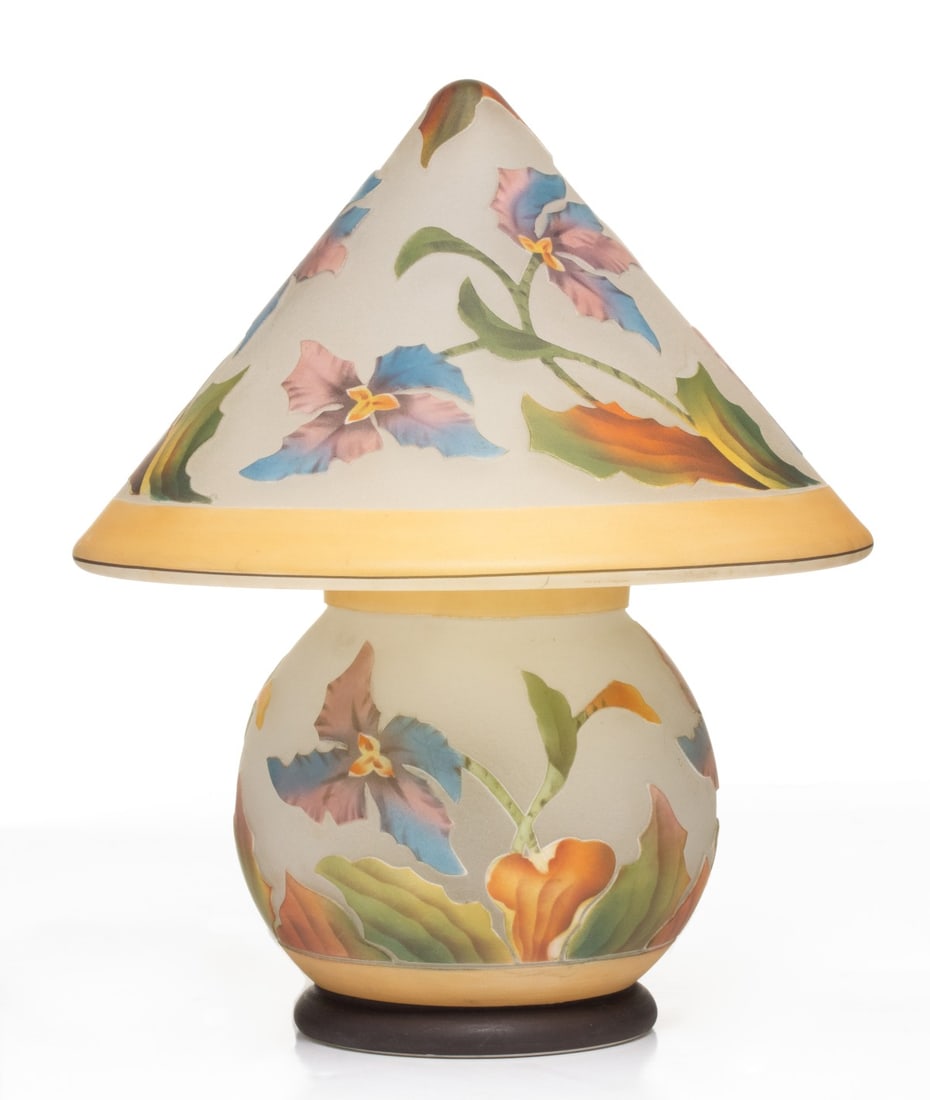 A 1920s ACID CUT ART DECO BOUDOIR LAMP SIGNED BELLOVA: The acid cut back art glass lamp with brightly colored floral designs in relief against a satin ground was made in Czechoslovakia for the H.G. McFaddin & Company, makers of the famous Emeralite ba