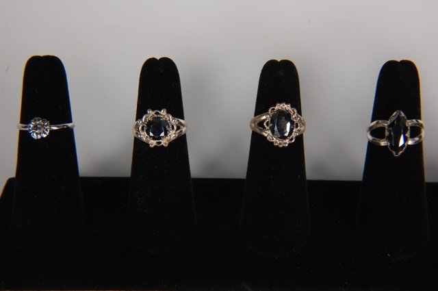 FOUR STERLING & HEMATITE RINGS BY BELL, SZ 6.5: Vintage sterling silver rings with Bell Trading Post's 'Black Diamond' faceted hematite stones, all sign Bell and marked sterling. Ring size 6.5. Designs measure .25 to .625 inches.