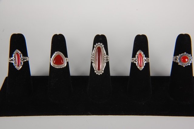 FIVE STERLING & CARNELIAN RINGS BY BELL, SZ 6.5: Sterling silver rings with carnelian cabochons, all signed Bell and marked sterling. Ring size 6.5. Designs measure from .625 to 1.375 inches.