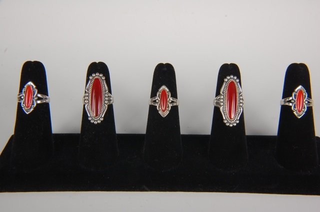 FIVE STERLING & CARNELIAN RINGS BY BELL, SZ 6.5: Sterling silver rings with carnelian cabochons, all signed Bell and marked sterling. Ring size 6.5. Designs measure from .75 to 1.375 inches.