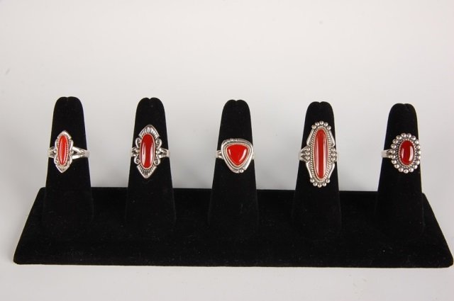 FIVE STERLING & CARNELIAN RINGS BY BELL, SZ 7: Sterling silver rings with carnelian cabochons, all signed with the Bell Trading Post logo and marked sterling. Ring size 7.