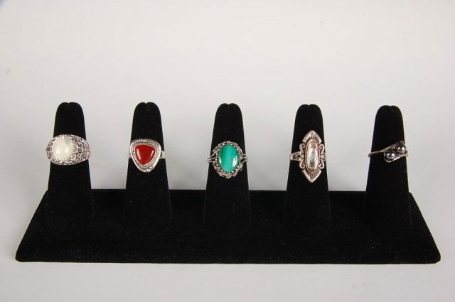 FIVE SEMI PRECIOUS RINGS BY BELL, SZ 7: One malachite ring in a heavy electroplate setting, marked 18KT HGE, one moonstone ring in a heavy electroplate setting, marked 14KT HGE, one abalone ring marked sterling and with the Bell Trading Pos