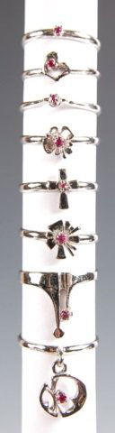 EIGHT STERLING & RUBY RINGS BY BELL, SZ 6: Sterling silver rings with small ruby gemstones, all are signed with the Bell Trading Post logo and marked sterling. Size 6.