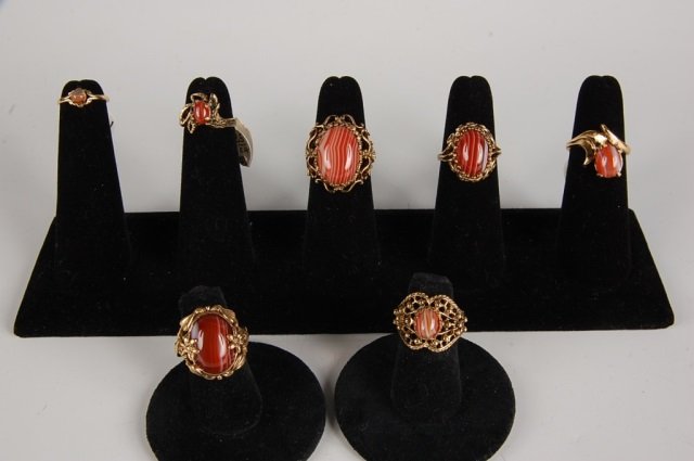 SEVEN BANDED AGATE RINGS BY BELL, SZ 2.5 to 6.5: Banded agate rings, four are marked 18KT HGE for heavy gold electroplate, the rest are unmarked. Sizes 2.5 to 6.5.