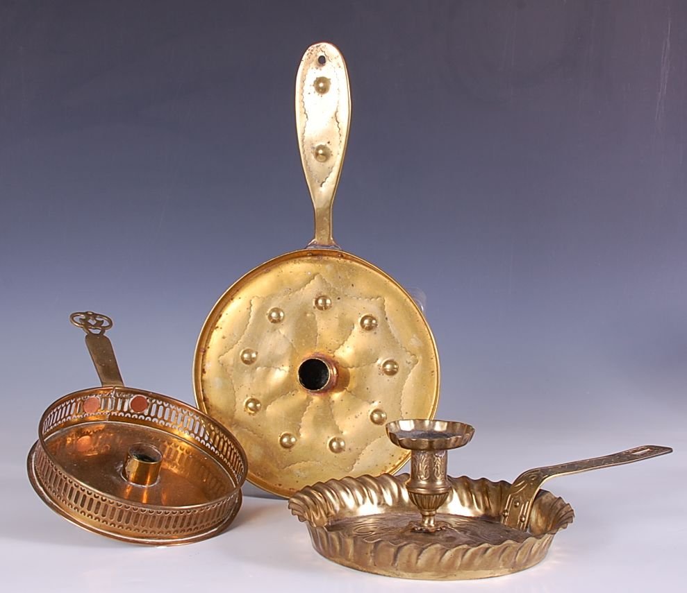 THREE 19TH C. BRASS CHAMBER STICKS: Measurements of 10.25 x 6, 12 x 8, and 14 x 7.5 inches