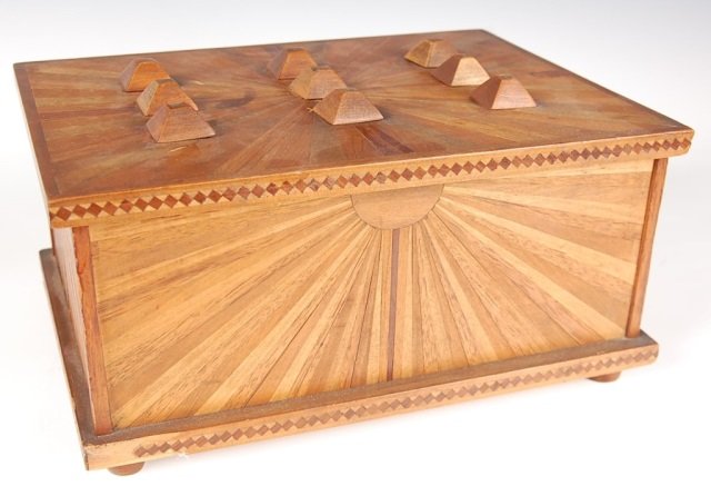 CIRCA 1930S FOLK ART MARQUETRY PUZZLE BOX: Opens with the correct combination of actions. Circa 1930s. Measures 6 x 10.5 x 8 inches