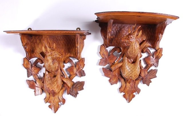 PAIR OF BLACK FOREST CARVED SHELVES WITH DEER AND: Each measures 10.5 x 9.8 x 5.25 inches.
