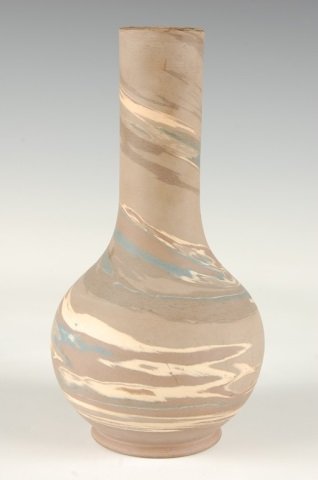 NILOAK MISSION WARE 8.5 INCH BOTTLE VASE: With impressed markings, measures 8.5 inches tall by 4.25 inches wide approximately.