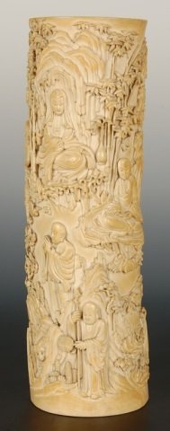 CARVED IVORY BRUSH STAND WITH DAOIST AND BUDDHIST: Carved in the round and covered with both lohans and non-lohans, Buddhist and Daoist symbols and figures. Measures 11.5 inches tall x 3.5 inches in diameter. NO INTERNATIONAL SHIPPING OF IVORY.