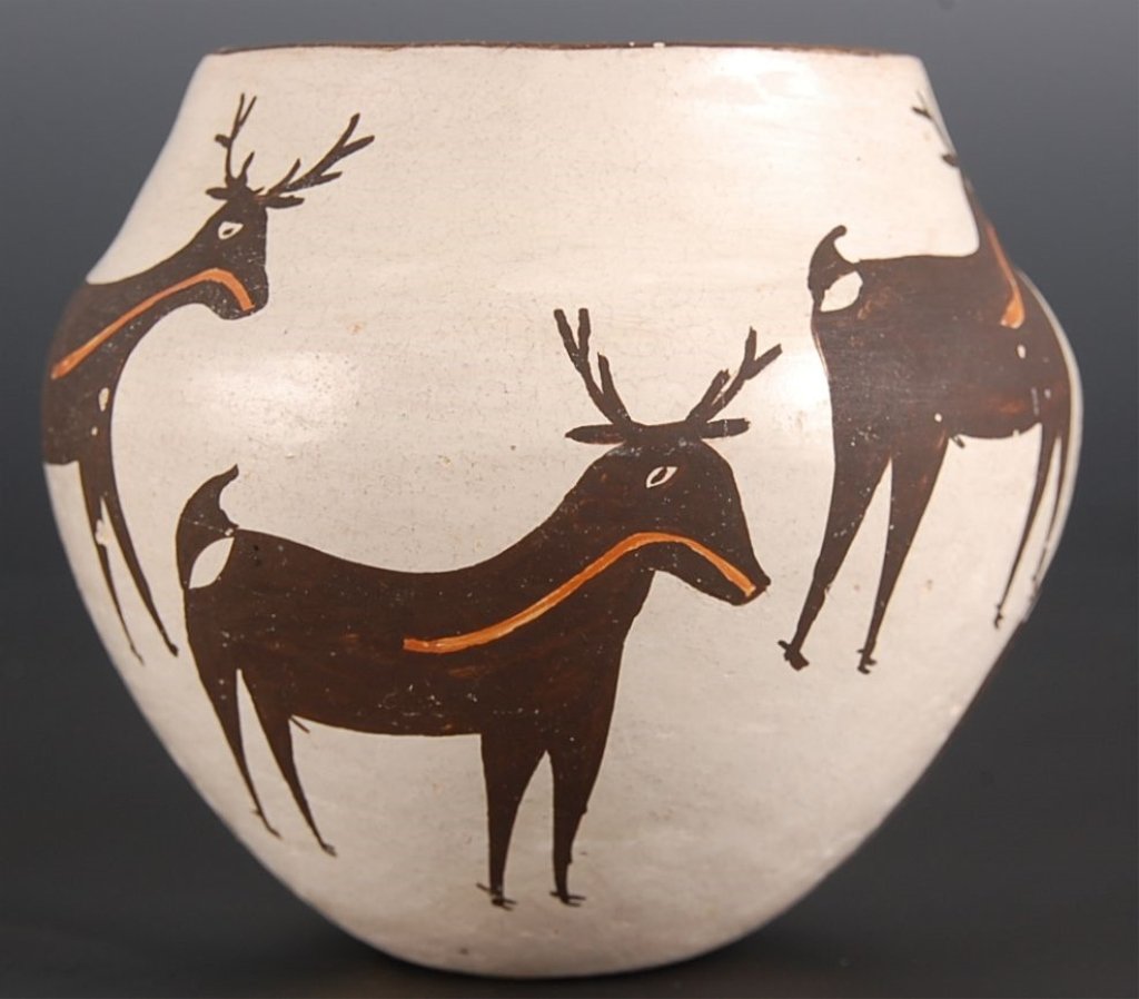 SMALL ACOMA POT SIGNED MARIE CHINO: With decoration of heart-lined deer, signed under the base M.Z. Chino. Measures 4 x 4.25 inches.