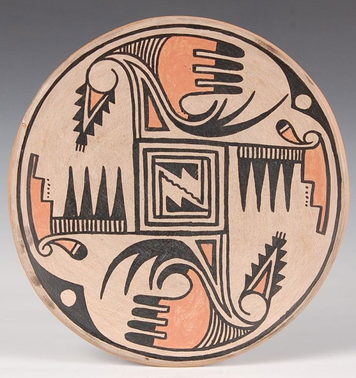 SAN ILDEFONSO SLIP DECORATED PLATE: Signed Joe Agular and Katherine. Measures 10.25 inches at diameter.