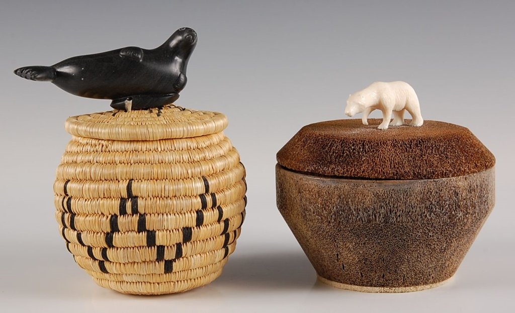 ESKIMO & CANADIAN BASKETS WITH FIGURAL ANIMALS: Athabascan basket with black soapstone seal finial and attribution to signed Annie Novalinga, Sanikiluag. Measures 5.5 x 4 inches. Plus a whale-bone box with carved ivory polar bear figure on the lid 
