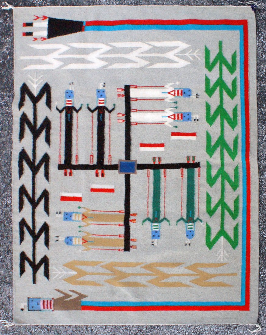 VERY FINE NAVAJO 'SAND PAINTING' PICTORIAL RUG WITH YEI: Measures 45 inches by 51 inches.