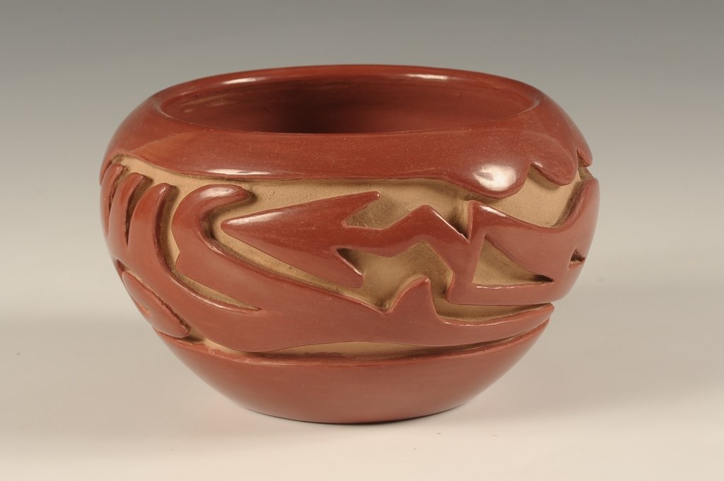 SANTA CLARA DEEPLY CARVED BOWL SIGNED TERESITA NARANJO: Two colored bowl with deeply carved Avanyu design. Measures 4 x 7 inches.