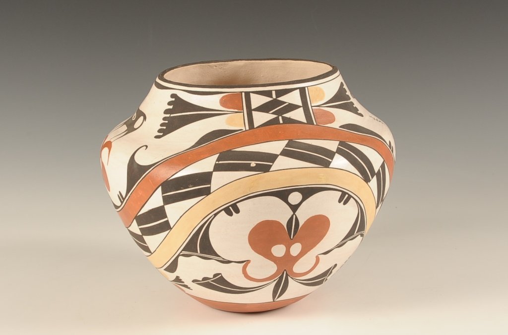ROSE CHINO CURTIS ACOMA JAR 8 X 10 INCHES: A fine large four color jar signed under the base Rose Chino Garcia Acoma, New Mexico. Measures 8 x 10 inches. Excellent example.