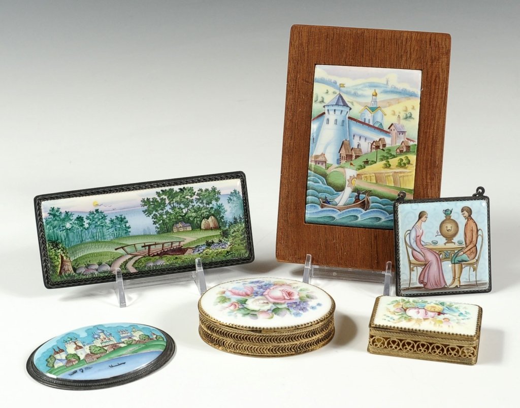 A GROUP OF MODERN RUSSIAN ENAMELS: Plaques and boxes set with hand painted enamel plaques. Measurements ranging in size from 2.25 x 2.25 inches up to 5.5 x 3.75 inches.