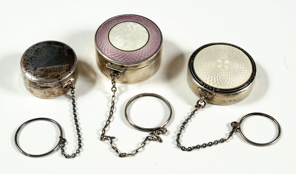 THREE STERLING SILVER COMPACTS INCL. GUILLOCHE ENAMEL: Each one marked sterling. Measurements ranging in size from 1 inch diameter up to 1.75 inches in diameter