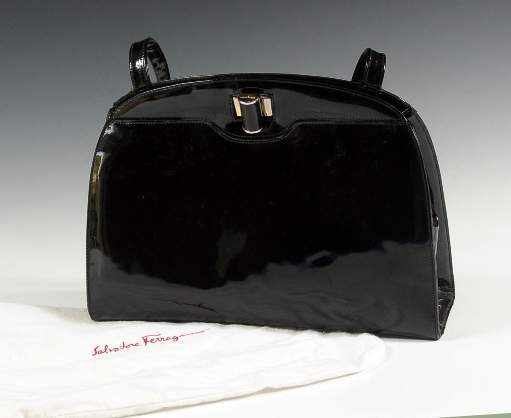 FERRAGAMO HANDBAG: Measures approximately 8 x 11.5 x 3.5 inches excluding strap.