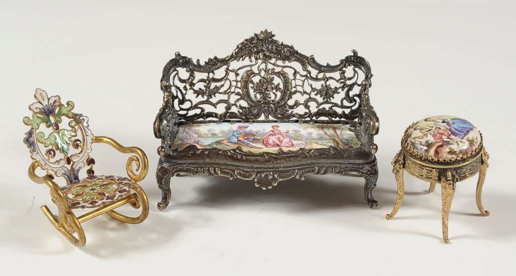 THREE PIECES VIENNESE ENAMEL FURNITURE: Three pieces, including a bench that measures 2 x 3 inches, a rocking chair measuring 1.75 x 1.5 inches, and a footstool that measures 1.5 x 1 inch.