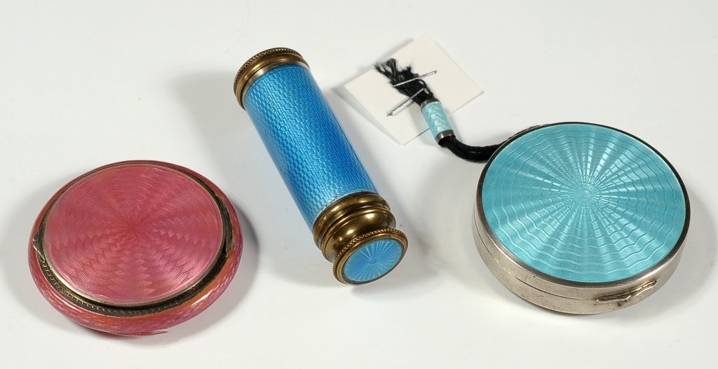 STERLING COMPACTS & PERFUMER WITH GUILLOCHE ENAMEL: Two round compacts with markings for sterling silver, the red example having enamel loss. Plus a cannister-shaped brass and enamel perfumer, with threaded bottom enclosure. Two round compacts measurin