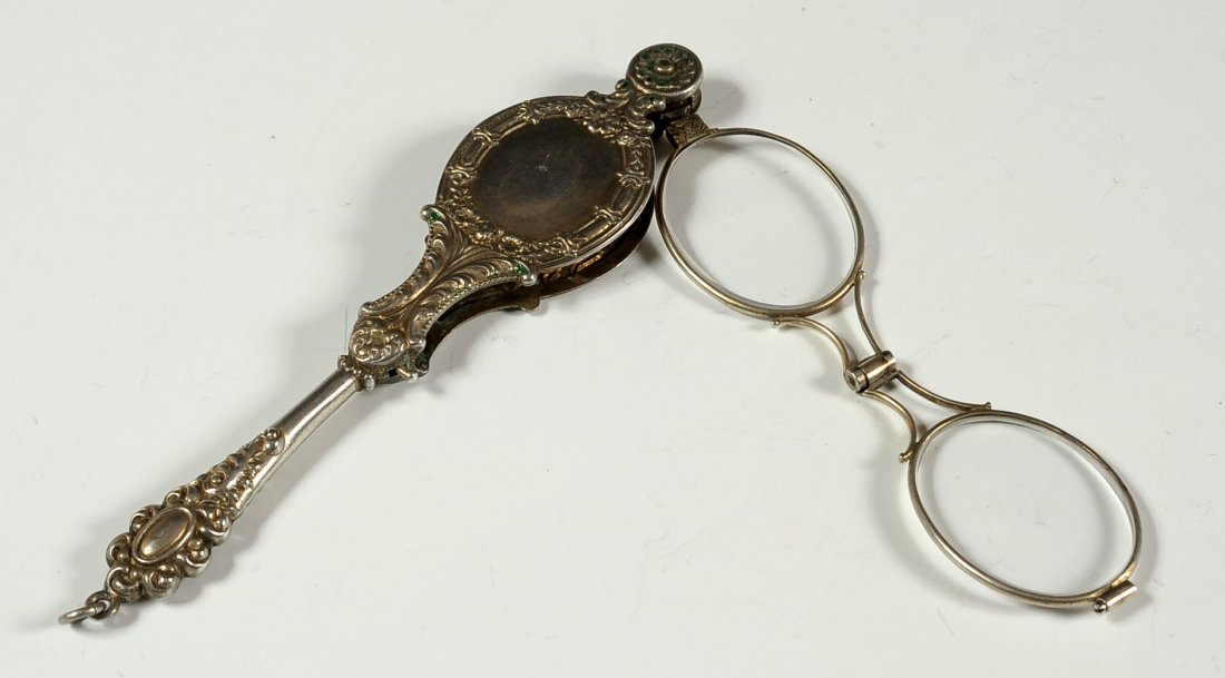 ANTIQUE LORNETTE EYEGLASSES: Nickel silver, 5 inches when closed.