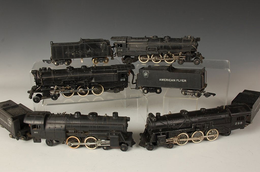 FOUR AMERICAN FLYER LOCOMOTIVES, 312, 315, 301, 290: Post-war S gauge, includes PRR 312, PRR 315, Reading Lines 301, 290. Show cosmetic wear, age, and use; unknown working condition, appear average.